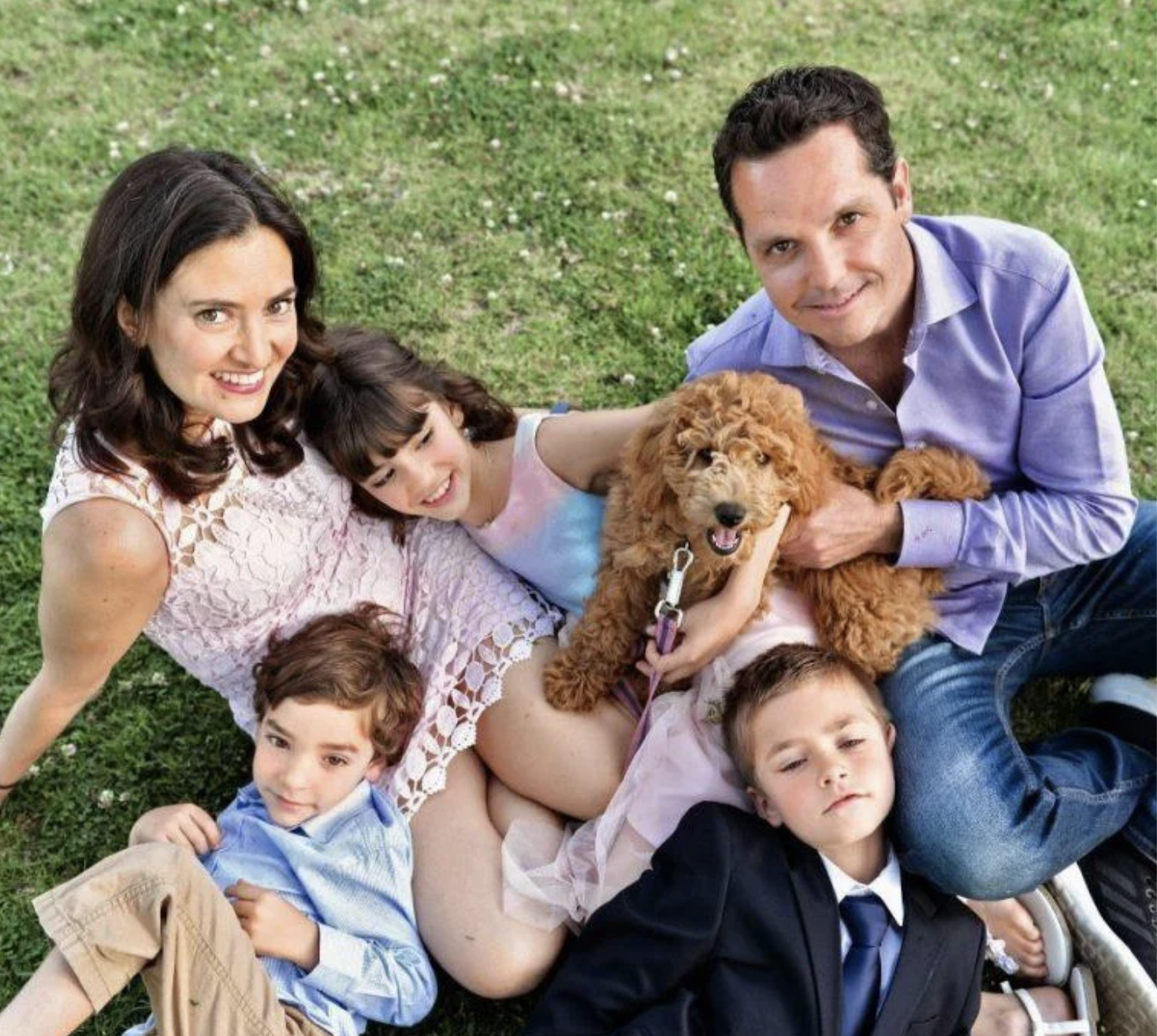 Margie and her family with one of the Doodles
